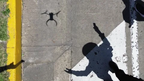 Drone Landing Assisted by Ground Operator, Aerial Equipment in Action Stock Footage 309164152