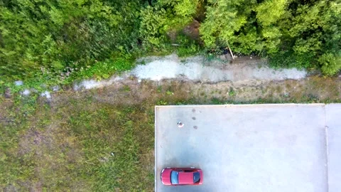 Drone landing at the car top-down view Stock Footage 135628515