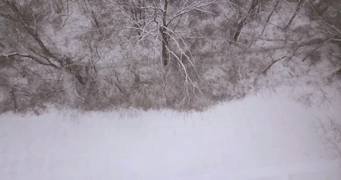 Drone landing in front of trees and highway Stock Footage 103293060