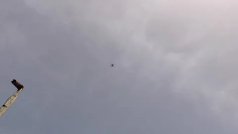 A Drone landing on surface Stock Footage 247734711
