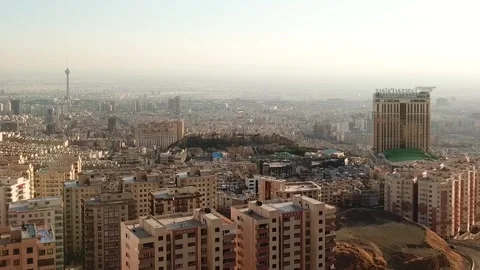 Drone landing view of Tehran Iran city landscape wide horizon Iconic Milad Stock Footage 255814553