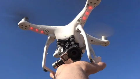 Drone lands in hand Stock Footage 127611473