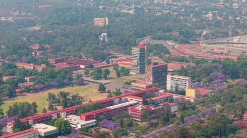 Drone landscape of central UNAM during spring with hazy atmosphere 스톡 동영상 334172753