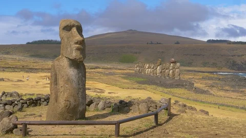 DRONE: Large human shaped monolith in front of a group of smaller statues. Stock Footage 110947845
