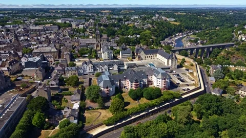 Drone lateral slide above Dinan with Saint-Sauveur Basilica and Dinan Viaduct Stock Footage 339964409