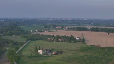 Drone lateral slide above Po Valley farmland near Monticelli d'Ongina Italy Stock Footage 340604276