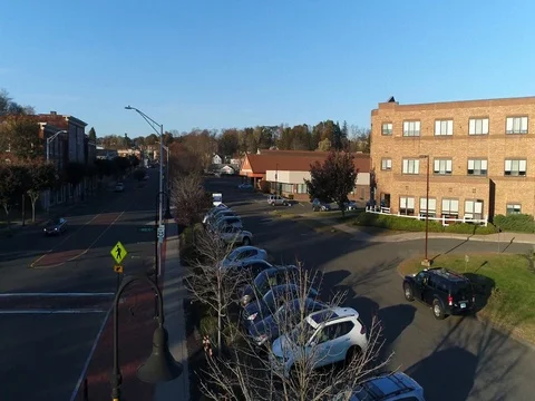 Drone launch shot in Bristol CT Veterans boulevard aerial Stock Footage 82326271