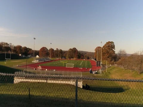 Drone launch shot bristol high revealing school football field Stock Footage 82326338