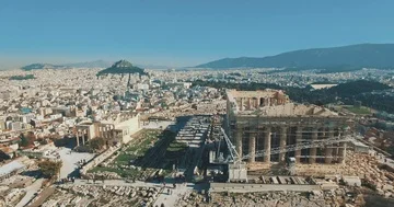 Drone lifting in front of Parthenon and revealing Acropolis Stock Footage 85580668