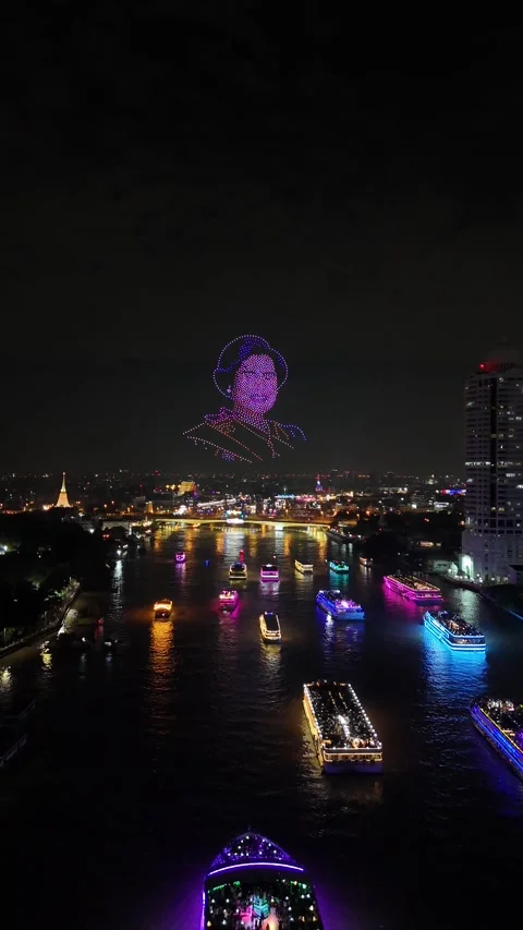 Drone Light Show Forming Portrait Above Chao Phraya River in Bangkok, Thailand Stock Footage 335969546