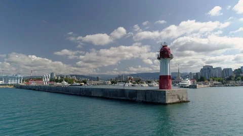 Drone lighthouse beacon Sochi unique Russia sight pier Cityscape skyline seaport Stock Footage 122018614