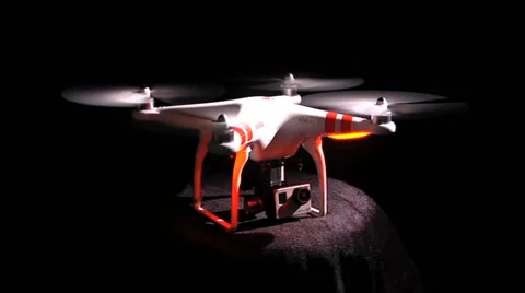 Drone with Lights Dark Background Camera Tilts Stock Footage 53612601