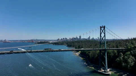 Drone Lions Gate Bridge with Downtown Vancouver Skyline, British Columbia C.. Stock Footage 329819780