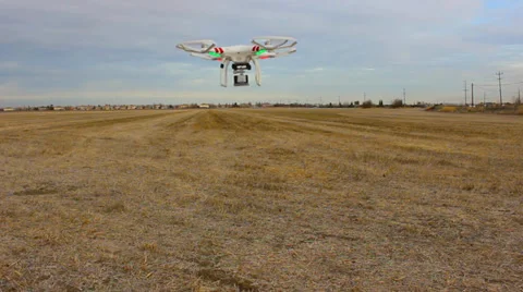 DRONE LONG :30 SEC HD CLIP QUAD-COPTER REMOTE RADIO CONTROLLED FLYING MACHINE Stock Footage 38053649