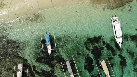 Drone looking down, pan camera up to reveal Mushroom Bay Beach, Nusa Lembongan Video stock 121143743