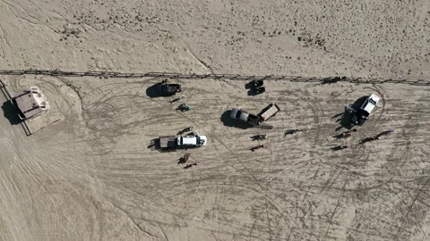 Drone looking down at parking lot in the Caineville desert Stock Footage 165567942