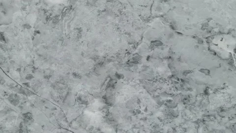 Drone looking straight down at a frozen lake covered in cracks.  Stock Footage 151905737