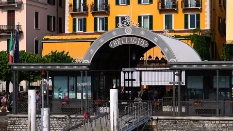 Drone low angle shot. Lake Como, Bellagio pier. Summer luxury tourism landmark Stock Footage 125878004