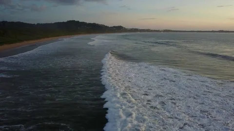 Drone low flight at dusk over Playa Grande Costa Rica Stock Footage 90972975