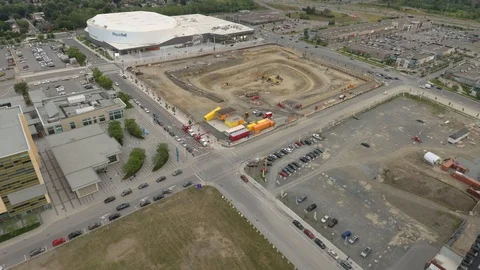 Drone lowering and approaching two mega to trucks getting ready to tow Vídeos de archivo 114712208