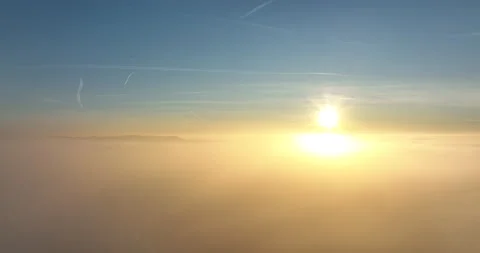 Drone - Lowering into clouds from a sunset - 5.1K ProRes Stock Footage 174699270