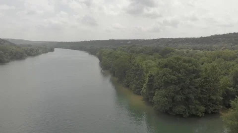 Drone Lowering until it Hovers Directly over the River Stock Footage 93413421