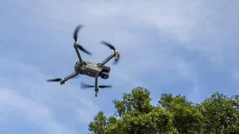 Drone machine with blue sky background for commercial marketing. Drone servic Foto stock