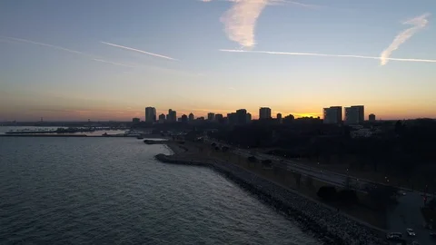 Drone Milwaukee Skyline Sunset Track Forward/ Up Stock Footage