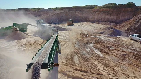 DRONE - Mining scene with front end loader, crushed rock and conveyor belt 스톡 동영상 107015463
