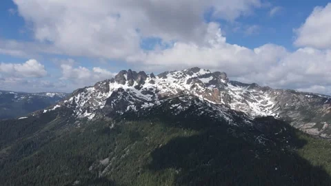 Drone Mountain with snow in spring Stock Footage 246706449