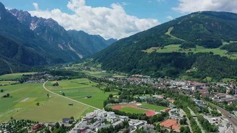 Drone mountain view in the city of Lienz, Austria. Alpine mountains and stadium Stock Footage 196193585