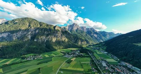 Drone mountain view in the city of Lienz, Austria. Aerial view over Dolomites Stock Photos