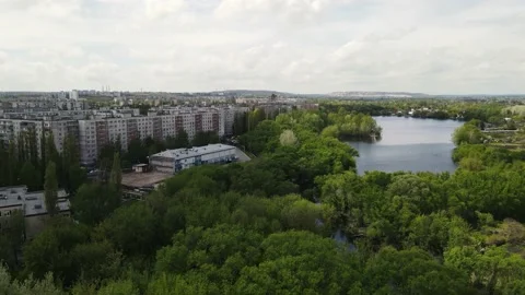 Drone moves along the river bed in the summer when everything is green Stock-Footage 168555262
