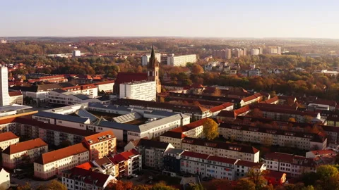 Drone moves away from St. Marien Kirche in Neubrandenburg and expands its Stock Footage 239106941