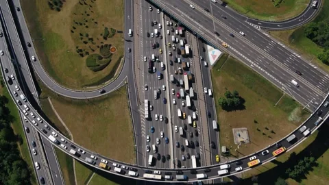 Drone moving above crowded highway and interchange loops Stock Footage 321370159