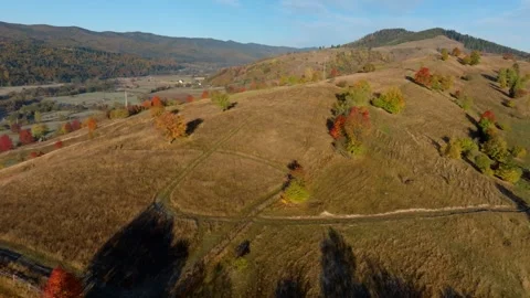 Drone Moving Along Hillside in Plesa, Suceava, Romania - Autumn Scenery Vidéo 291048070