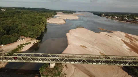 Drone moving away from a bridge over the loire 스톡 동영상 124866710
