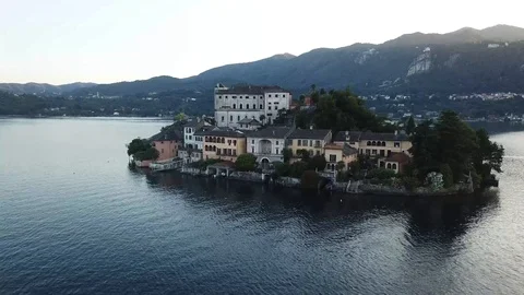 Drone moving away from San Giulio Italy Stock Footage 94875265
