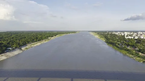 Drone Moving Backward Over the Gorai River as Haripur Bridge Appears Video stock 342517421