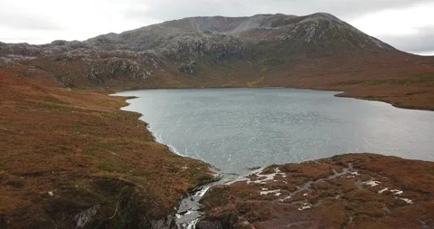 Drone moving backwards over Wailing Widow Falls Stock Footage 169357079