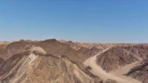 Drone moving down - desert mountains Stock Footage 202133964