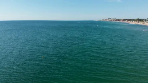 Drone Moving Fast Over Blue Water of the Sea Ocean Resort Stock-Footage 115047090