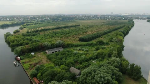 Drone moving forward above river landscape Stockbeeldmateriaal 324756658