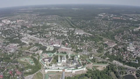 Drone moving forward and descending over city monastery Video stock 332309674