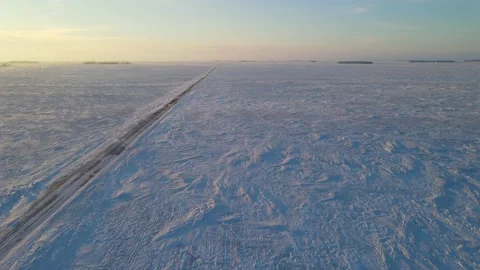 Drone moving forward and looking down onto farm fields  Stock Footage 228687235