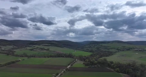 Drone moving forward high above a prairie setting of autumn countryside views Stock Footage 201488791