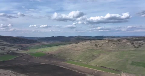 Drone moving forward high above a prairie setting of autumn countryside views Stock Footage 201488836
