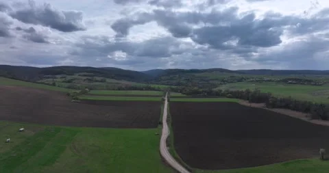 Drone moving forward high above a prairie setting of autumn countryside views Stock Footage 201488943