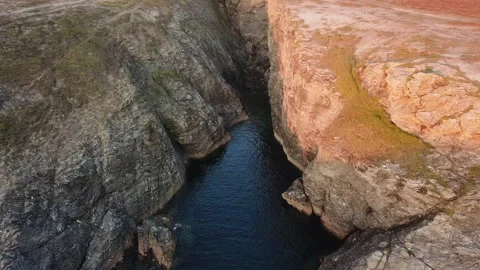 Drone moving forward inside a rocky fault Stock Footage 164581628