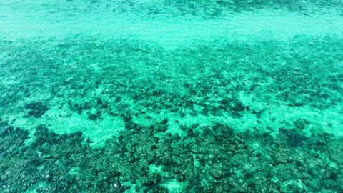 Drone moving forward over turquoise waters at Koh Ngai, Thailand – 4K Video stock 325022363